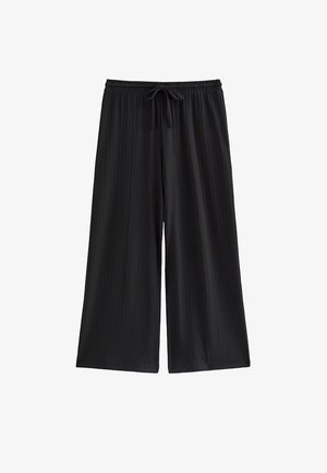 Pantalones negros de pierna ancha con textura acanalada vertical y una cintura elástica con cordón delantero.