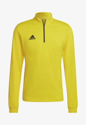 Gelber sportlicher Pullover mit langen Ärmeln, hohem Kragen, halbem Reißverschluss vorne und schwarzem Adidas-Logo auf der linken Brust. Glattes Polyestergewebe.