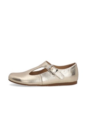 Gold metallic ballet flats with a cutout design and ankle strap. The shoe has a rounded toe and flat sole. On a white background.