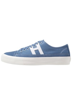 Low-top blue canvas sneaker with white rubber sole, white stitching, laces, and a large white "H" on the side.