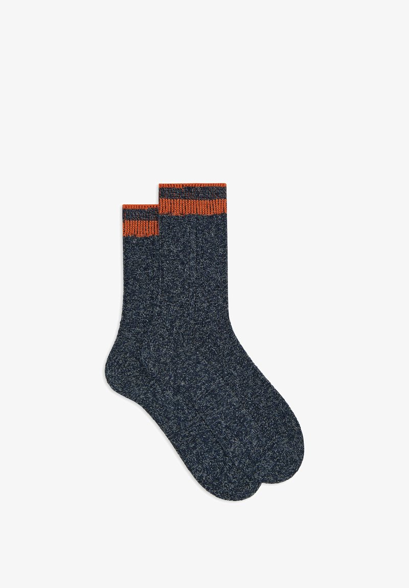 Calzini in misto cotone blu scuro con polsino a coste a righe arancioni. Tessuto a maglia, lunghezza fino a metà polpaccio, punta arrotondata.