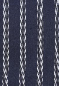 Navy blue fabric featuring vertical stripes of white dots, creating a textured pattern. The material appears soft and knitted.