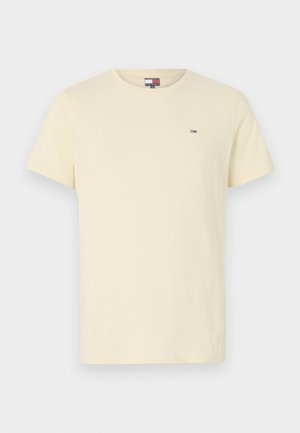 Short-sleeve, crew-neck t-shirt in light yellow cotton. Features a small embroidered logo on the chest. Soft texture, regular fit.