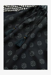 Unselected, navy cream floral print