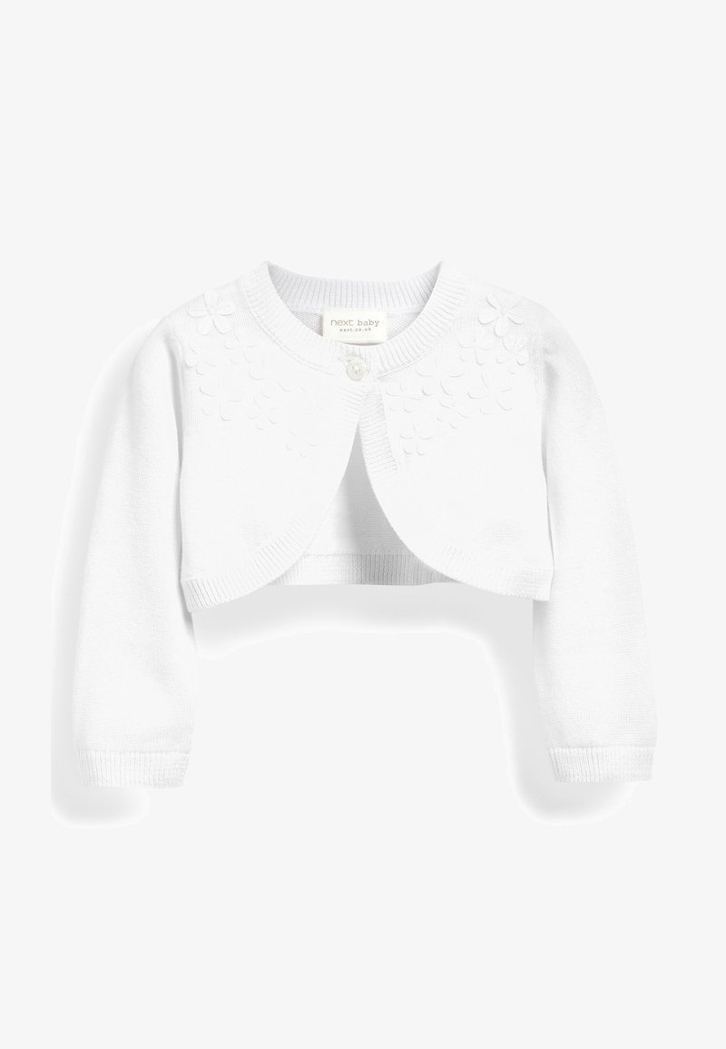 Cardigan blanc en tricot pour bébé avec manches longues, un seul bouton sur le haut, et des détails en applique florale sur la poitrine et les épaules.