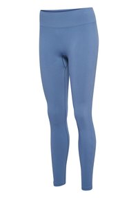 Ljusblå leggings gjorda av mjukt, stretchigt tyg med hög midja. Har en ribbad textur och sömlös design för ökad komfort.