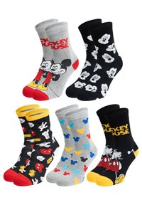 Quattro paia di calzini di cotone con design di Topolino. I colori includono grigio, nero, giallo, rosso e blu, con vari motivi e grafiche.