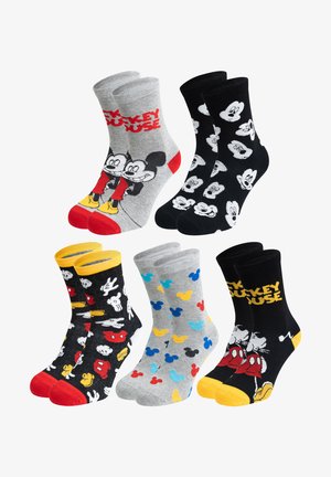 Quattro paia di calzini di cotone con design di Topolino. I colori includono grigio, nero, giallo, rosso e blu, con vari motivi e grafiche.