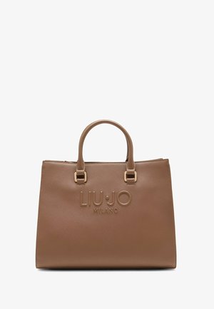 Brown synthetic handbag with a structured shape, featuring dual top handles, embossed logo, and gold-tone hardware accents.