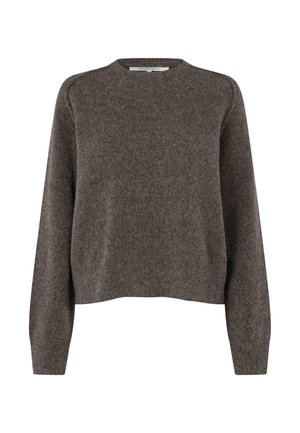 Brun stickad tröja med rund hals, långa ärmar och ribbade muddar. Har ett texturerat, mjukt utseende och något croppad nederkant.