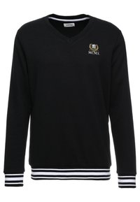 Černá mikina se zavinovacím výstřihem, dlouhými rukávy a bílými pruhy na manžetách a spodním lemu. Obsahuje vyšívané zlaté a bílé logo.