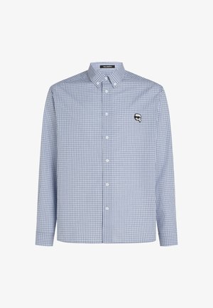 Košulja dugih rukava s plavim i bijelim kariranim uzorkom, s kragnom i malim crnim logom na prsima. Glatka tkanina.