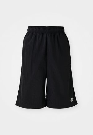 Sorte Nike-bukser med elastisk midjebånd, løstsittende passform og mykt stoff. Har en liten logo på nederste venstre side.