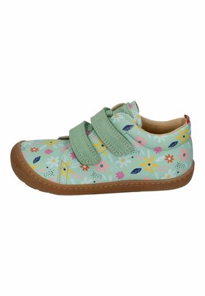 Child's light blue shoe with floral print, two green Velcro straps, and a brown rubber sole, viewed from the side.