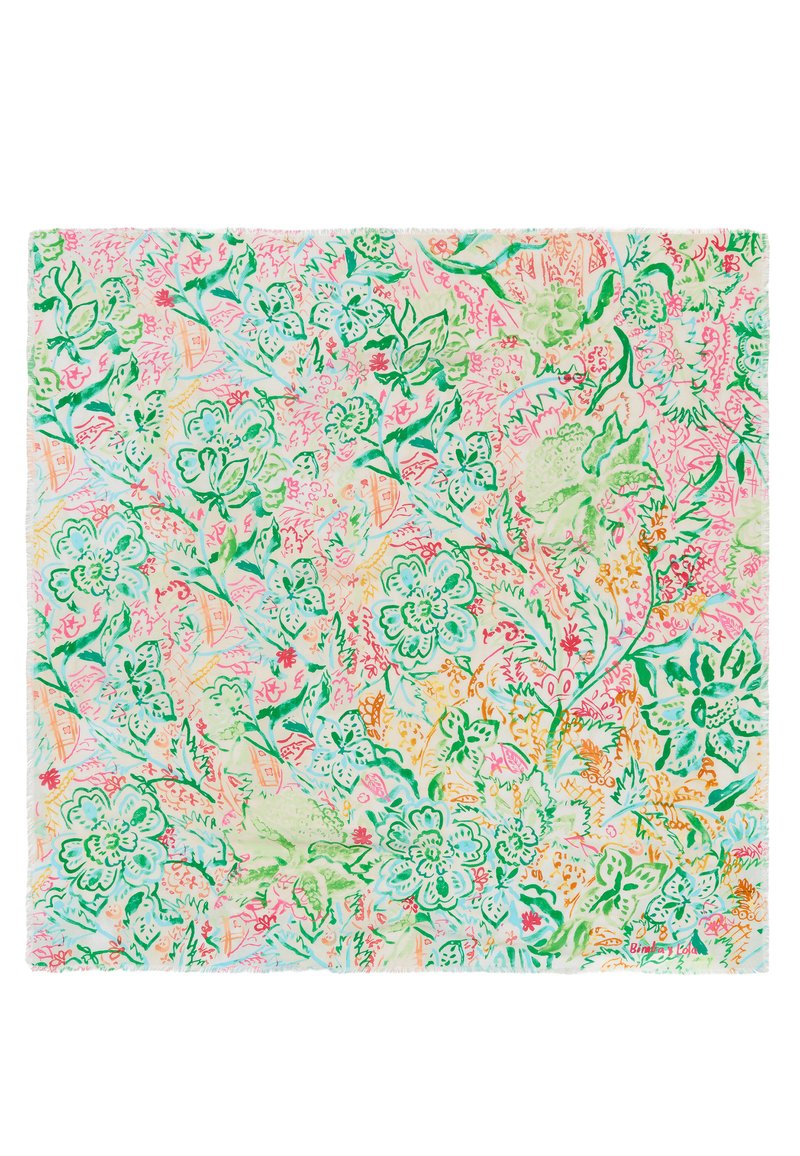 Kleurrijke bloemenstof met groene, roze en oranje patronen op een crème achtergrond, met textuurweave en rafelige randen.