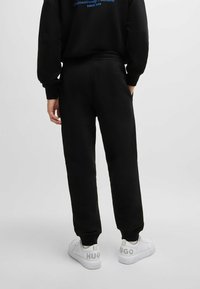 HUGO Pantalones deportivos - black one