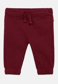 Μπορντό φόρμα από μαλακό βαμβακερό μείγμα, με ελαστική μέση και κορδόνι, καθώς και ελαστικές μανσέτες στους αστραγάλους.