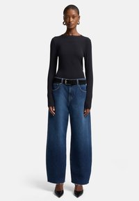 Bonnie Curvilinear Santa Cruz With Raw Cut - Wide Leg Jeans | 7 For All Mankind