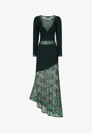 Robe à manches longues de couleur vert foncé avec un corsage ajusté, des détails en maille transparente, de la broderie florale en vert, et une ourlet asymétrique.