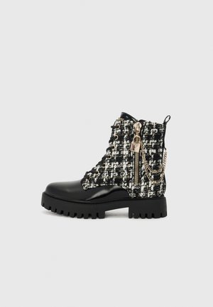 FIORELO - Veterboots - black/white