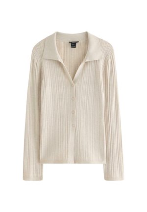 Cardigan a coste di colore beige chiaro con scollo con colletto, bottoni frontali e maniche lunghe con superficie strutturata.