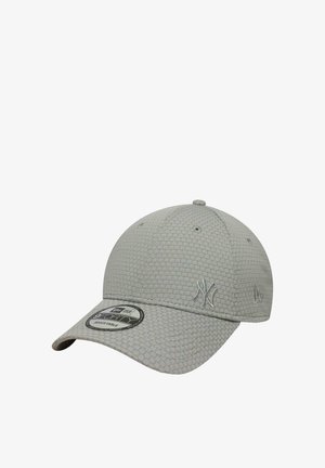 Light gray adjustable baseball cap with a textured pattern, featuring a New York Yankees logo embroidered on the front.