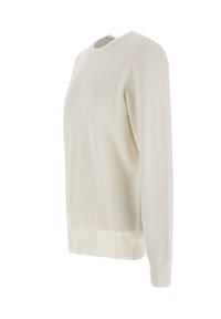Maglione color crema con un design a maglia testurizzata, scollo rotondo e orlo e polsini a costine. Dettaglio logo discreto sul petto.