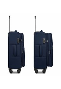 Valigia rigida blu navy con superficie testurizzata, doppie tasche laterali, manico estensibile e quattro ruote girevoli per una facile mobilità.