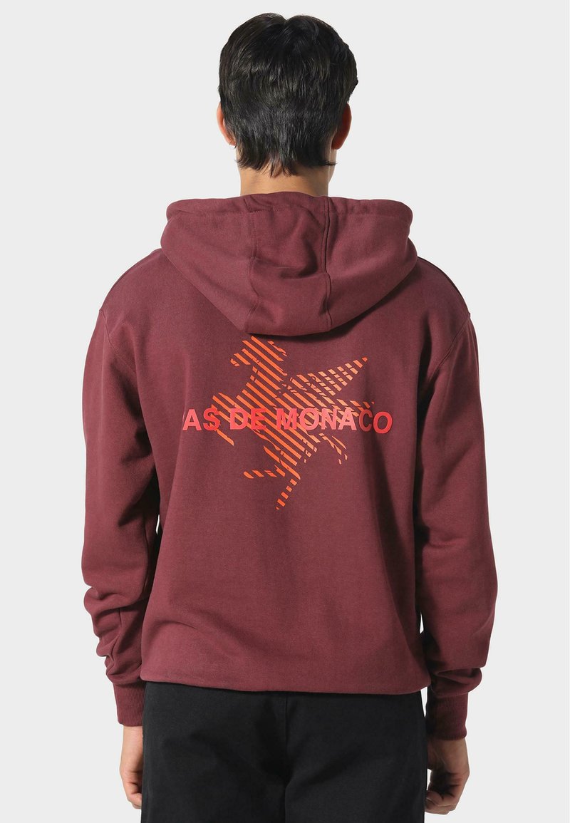 Felpa maroon con cappuccio, maniche lunghe e una grafica di un cavallo a strisce arancioni con il testo "AS DE MONACO" sotto.