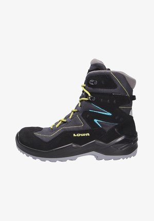 Black suede and textile hiking boot with gray and yellow accents, high ankle support, lacing system, and rubber outsole for traction.