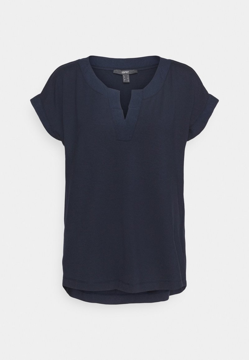 Marinblå t-shirt med kort ärm och V-ringning, tillverkad av ett mjukt material, med en avslappnad passform och något rundad nederkant.