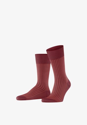 Bordeauxrote gestreifte Socken mit einem gerippten Bündchen, aus weichem Material. Sie haben vertikale Streifen in einem etwas dunkleren Farbton.