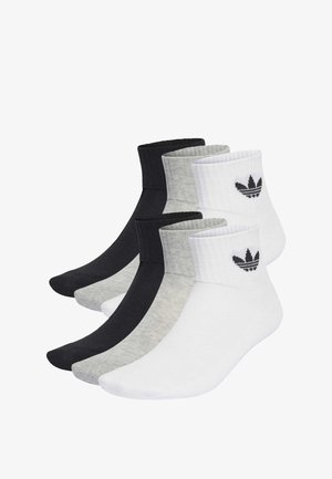 Három pár bokazokni fekete, szürke és fehér színben. Pamutból készült, bordás szegéllyel és az Adidas logójával a fehér zoknin.