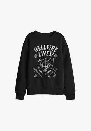 Black sweatshirt with white graphic text "HELLFIRE LIVES!" above a horned skull on a shield, flanked by fantasy weapons and dice symbols.