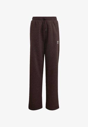 Smeđe, široke trenirka hlače napravljene od mekog materijala. Imaju elastični pojas s vezicama i bočne džepove. Mali logo na bokovima.