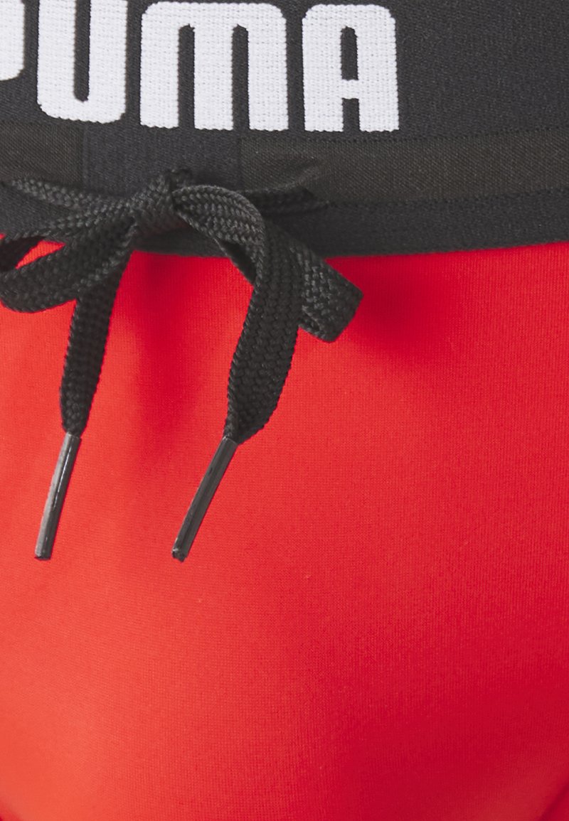 Puma SWIM MEN LOGO BRIEF - Plavky slipy - red