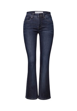 Jeans évasés en denim bleu foncé avec une taille mi-haute, cinq poches et des coutures visibles. La texture du tissu est lisse avec un léger stretch.