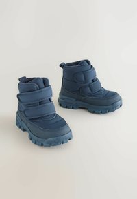 Marineblaue isolierte Stiefel mit plüschigem Innenfutter, Gummisohlen und drei verstellbaren Klettverschlussriemen. Mit robustem Profil für bessere Traktion.