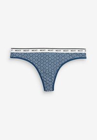 Tangă bleumarin dintr-un material cu un model ce include mici flori albe, completată cu un tiv alb pe care se află brandul "NEXT".