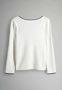 Fehér, hosszú ujjú felső, texturált kötött anyagból, fekete szegéllyel ellátott kerek nyakkivágással és egyszerű mandzsettákkal. Simított és testhezálló kialakítás.