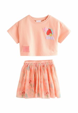 Peach cotton crop top with Ariel graphic, paired with a layered skirt featuring a seashell and starfish pattern in pastel colors.