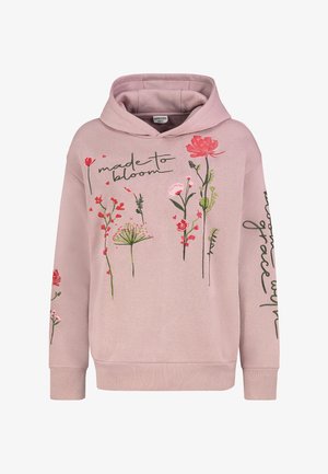 Hoodie in zacht roze, met bloemrijke borduurwerk in rood en groen, met de tekst "made to bloom" op de voorkant en details op de mouw.