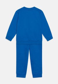 Puma MINICATS CREW JOGGER UNISEX SET - Chándal - racing blue
