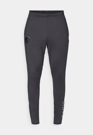 Pantaloni sportivi gri, cu talie elastică, design cu picior tapered și detalii cu logo pe lateral. Confecționați dintr-un material neted și elastic.