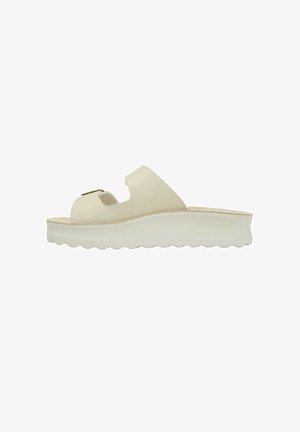 Sandalo aperto beige con una tomaia testurizzata, cinturino regolabile e una spessa suola bianca piatta con bordo ondulato.