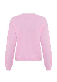 Maglione rosa chiaro con scollo rotondo, maniche lunghe leggermente gonfie e orlo a coste. Texture morbida con un design semplice e pulito.