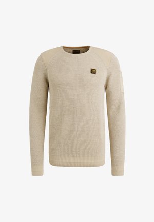 Lichtbeige trui van gestructureerde brei stof, met een ronde hals, lange mouwen en een klein logo-embleem op de borst.