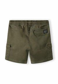 Bermuda cargo verde oliva con cintura elastica, tasca posteriore e tasca laterale. Realizzate in un tessuto resistente con dettagli di cucitura visibili.