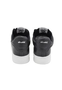 Black leather sneakers with textured uppers and white soles, featuring a padded collar and printed branding on the heel and tongue.