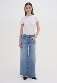 My Essential Wardrobe DANGOMW HIGH X-WIDE  - Platėjantys džinsai - light blue retro wash